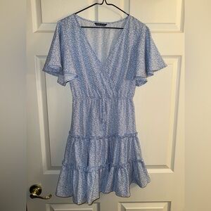 Light blue with white flowers Sheen dress with front bow size extra small